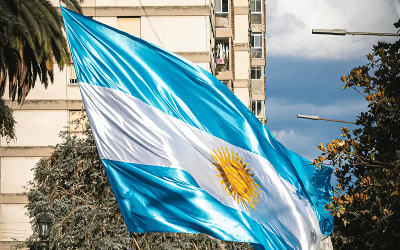 Argentina flag fluttering infront of the building