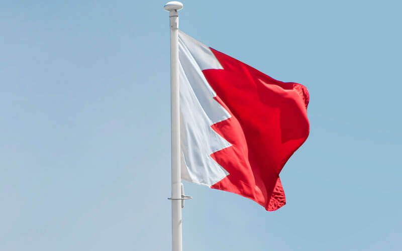 Flag of Bahrain flying in the sky