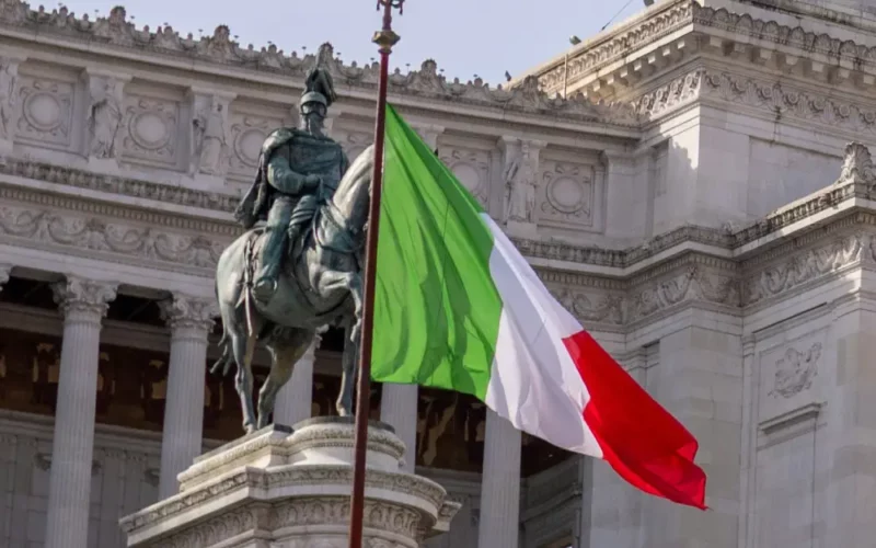 Flag of Italy in front of the historical building