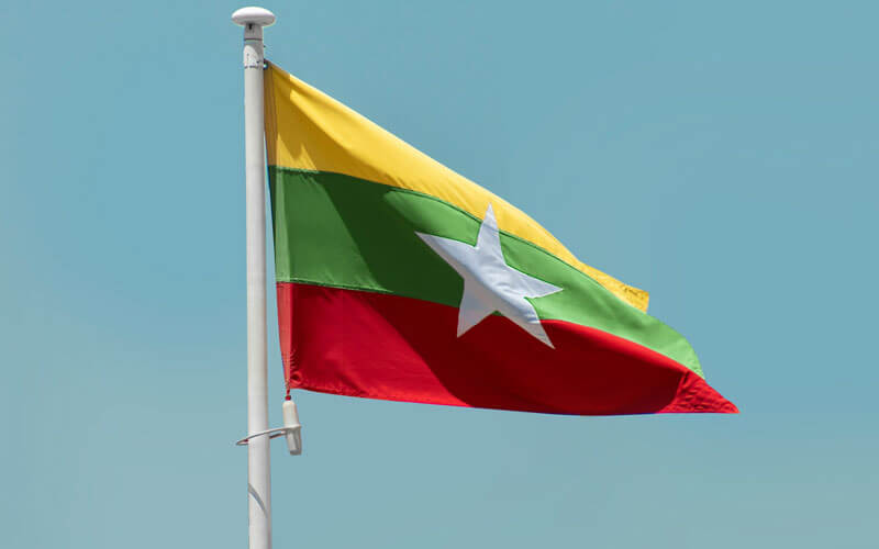 Flag of Myanmar flying in the wind