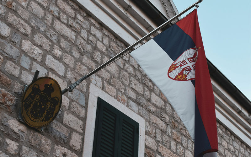 Flag of Serbia on the wall of the building