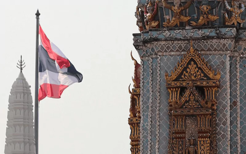 Flag of Thailand above the temple