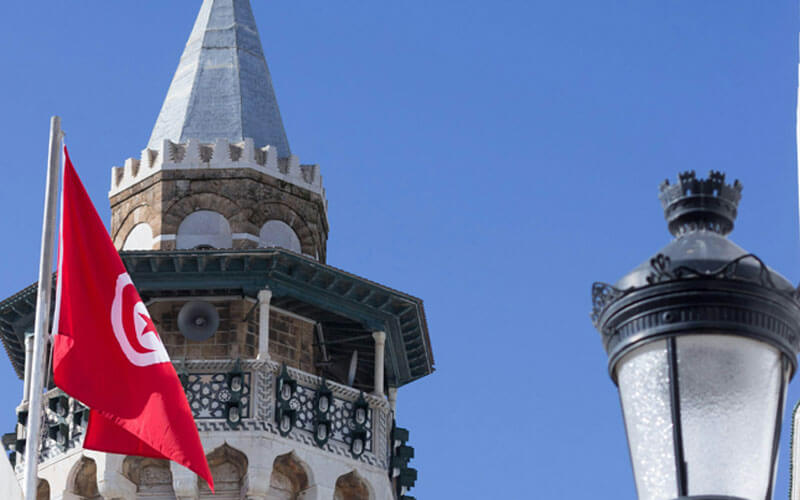 Flag of Tunisia besides the tower