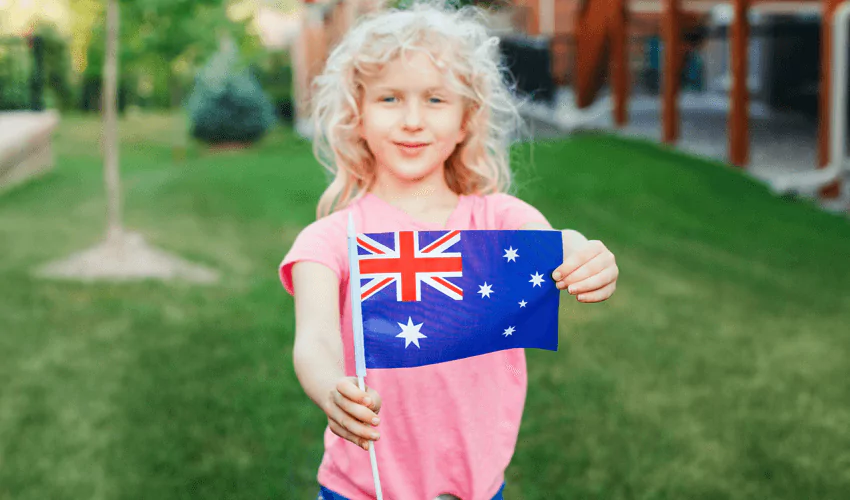 Girl holding blue red and white australian flag