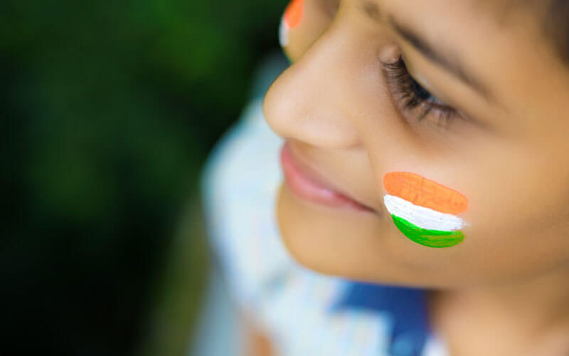 Girl with Indian Flag Paint on the Face
