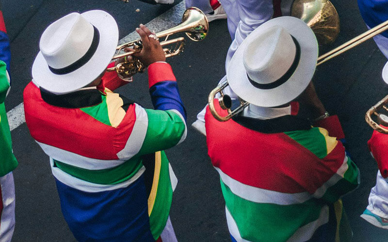 People dressed up in South African flag colors