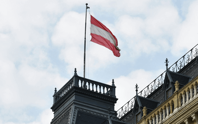 Red and white Austrian flag at the building
