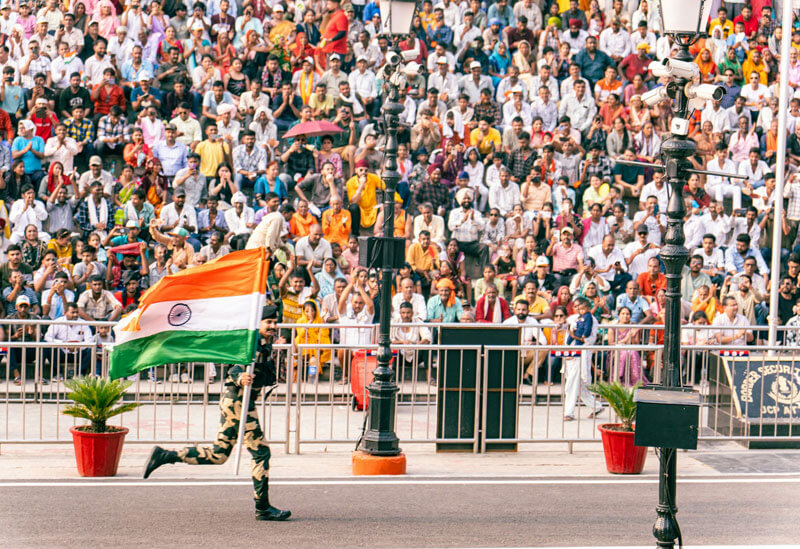 Soldier running with Indian Flag
