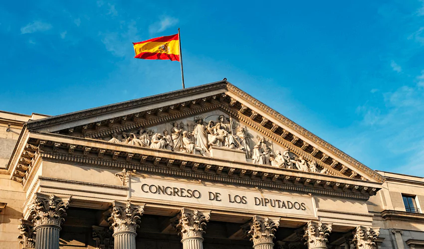 Spainish flag on the architectural sculptured building
