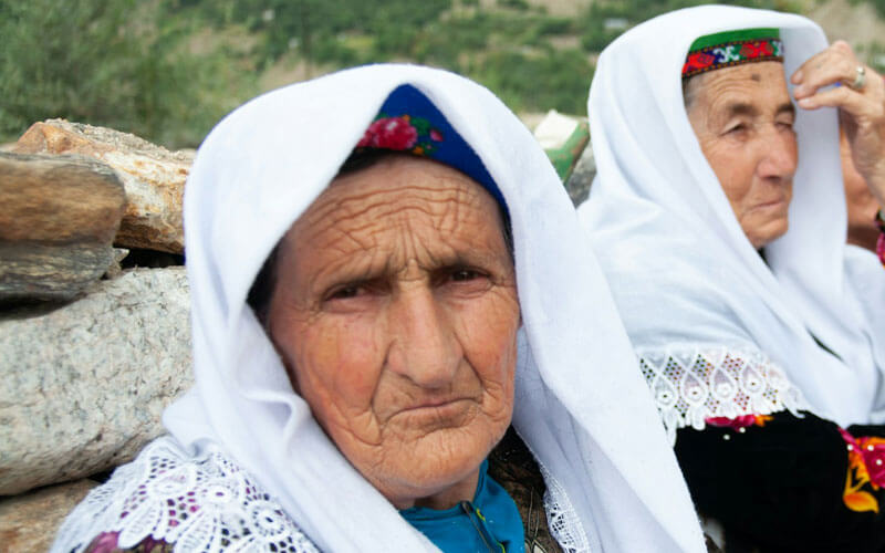 Tajikistani Women sitting on the Field